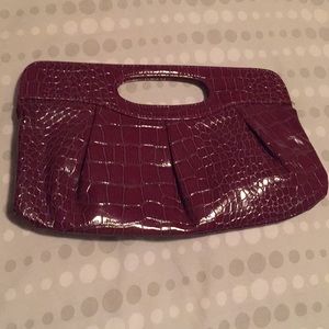 Medium size burgundy clutch
